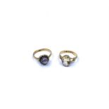 Two dress rings, set quartz, both bearing marks for '22ct.', 7.3g. total (2)