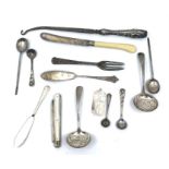 A collection of silver items, including:- a mother of pearl handled fruit knife, two tea