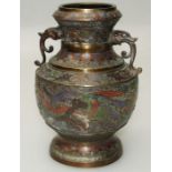 An early 20th century Japanese cloisonné vase of stepped baluster form with twin kylin mask handles,