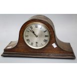 A late 1920's oak Napoleon Hat mantle clock, the eight day Westminster chiming movement striking