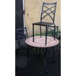 A contemporary steel framed patio suite, comprising circular table with brick mosaic top, 90cm