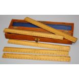 Negritti and Zambra, an Edwardian mahogany cased set of five 31.5cm boxwood rules