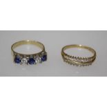 An 18k sapphire and diamond ring, channel set three blue sapphires alternated with two round
