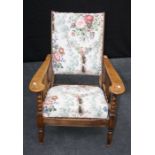 Elliston and Cavell, Oxford, an early 20th century oak ' plantation' reclining armchair with