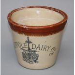 An Edwardian stoneware Maypole Dairy 4LB measure, with transfer decoration