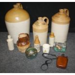 A large glazed earthenware storage jar, stamped John A Stephen, wine merchant, 27 High Street,