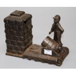 A cast iron ' Artillery Bank ' money box, stamped May 1892 to base, 15 x 20cm