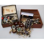 A large collection of costume and paste set dress jewellery including necklaces, brooches, earrings,