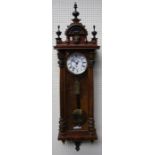 A late 19th century Vienna wall clock, the half turned column case enclosing a single train movement