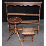 A bobbin turned ' Gypsy' tripod table, a florally carved oak footstool and a 19th century oak and