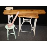 A scrub top pine table with cast iron 'Singer' treadle sewing machine base, a pine 120cm shelf,