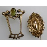 A green paste set Art Nouveau style easel form brooch stamped Miracle, 4cm together with a 9ct