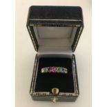 A 9ct 'DEAREST' ring set round brilliant cut diamond, emeralds, amethyst, ruby, sapphire 2.3g,