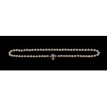 A single row cultured pearl necklace, comprising round cream pearls with pink overtone, each approx.