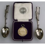 A pair of 1920's Chinese export silver presentation shooting teaspoons, each fashioned as a rifle