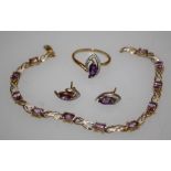 A suite of 9ct gold and pale amethyst jewellery, comprising an eleven stone, diamond chip set tennis