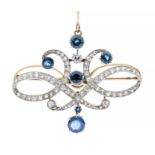 A Belle Époque sapphire and diamond 18ct gold pendant/brooch, comprising symmetrical open scrolls