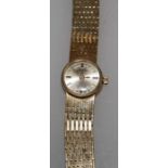 A 9ct Rotary Lady's watch with baton numerals and woven strap, total weight, 27.4g in box