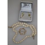 A Ciro cultured pearl necklace with 9ct yellow gold clasp, a 9ct cultured pearl wreath brooch and