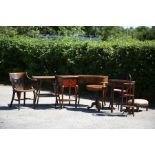 A collection of furniture comprising a 1930s captains chair, an Edwardian two-tier occasional table,