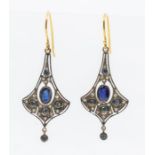 A pair of sapphire and diamond drop earrings, silver gilt, set the centre with a suspended oval