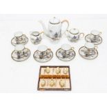 Early 20th Century Japanese tea set with pot, sugar and cream, along with cased plated spoons