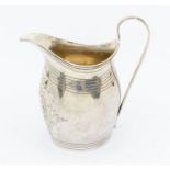 A George III silver cream jug, later engraved decoration, hallmarked London, 1800, 3.26ozt