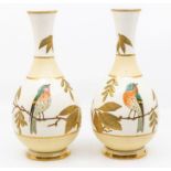 A pair of Wedgwood vases with decorative bird design