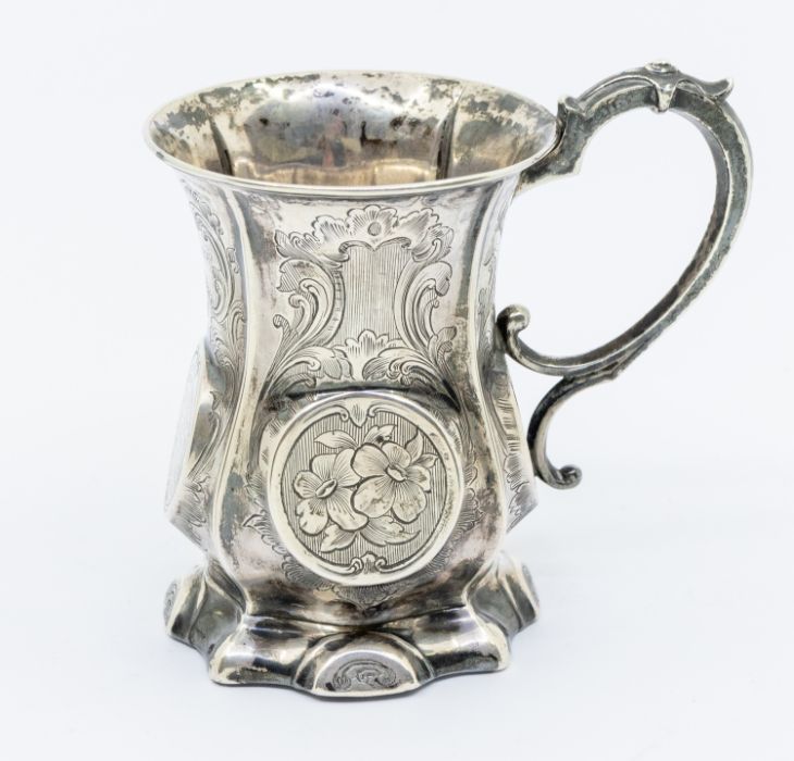 A Victorian silver baluster mug, engraved decoration and central roundels, with later presentation