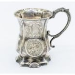 A Victorian silver baluster mug, engraved decoration and central roundels, with later presentation