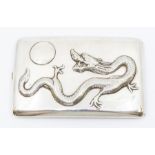 An early 20th Century Chinese Export cigarette case, the cover chased with three claw Dragon and