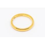 A 22ct gold wedding band, width approx. 3.5mm, size Q, total gross weight approx. 6gms Condition