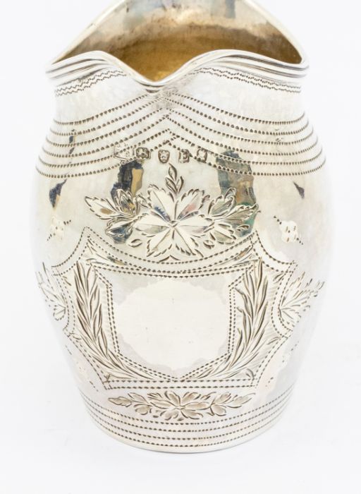 A George III silver cream jug, later engraved decoration, hallmarked London, 1800, 3.26ozt - Image 2 of 3