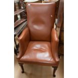 George III armchair recovered in brown leatherette with padded legs