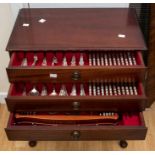 A canteen of Community plate, ornate design, in a mahogany stand, including three drawer unit with