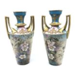A pair of limoges vases 29cm high