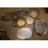 An oval twin-handled pewter tray, various other plated trays, brass trays etc