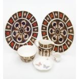 Two Royal Crown Derby 1128 pattern dinner plates, first quality, 1128 cream and sugar bowl, pin