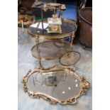 A 1980's powder coated brass serving trolley, gilt mirror, onyx telephone