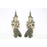Two Eastern cast bronzed kneeling God and Goddess, 58 cms high approx