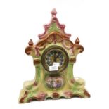 Early 20th Century ceramic clock, heavily glazed with ladies dancing transfer to front