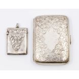 An Edward VII silver cigarette case, engraved, by H.H, Birmingham 1909 together with an Edward VII