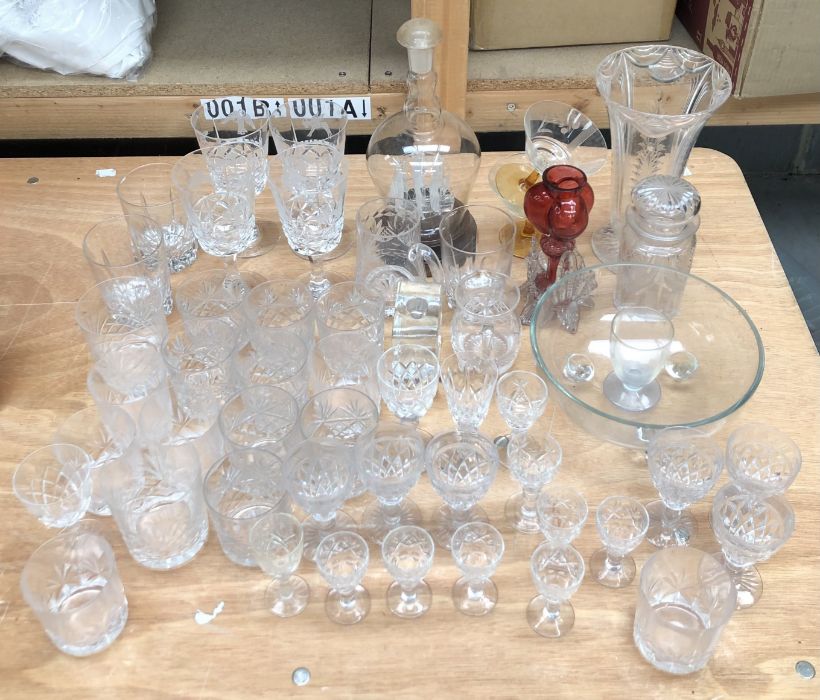 A large collection of glassware, to include:- cut glass, sherry and port glasses, tumblers, a ship