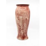 Moorcroft: A William Moorcroft dappled pink/red oxide vase on cream ground. Height approx 31cm.