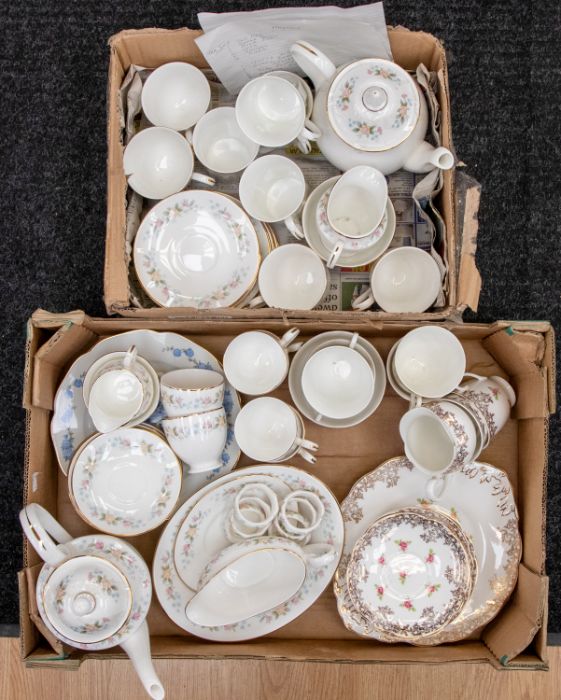 A Crown Staffordshire part tea set, nine cups, saucers, side plates, milk and sugar, another tea set