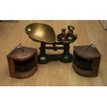 A pair of copper port and starboard lamps; a set of scales with seven brass weights, Thornton & Co.