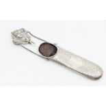 An Edwardian silver Chatelaine spectacle holder, the body engraved with leaves, the ornate clasp