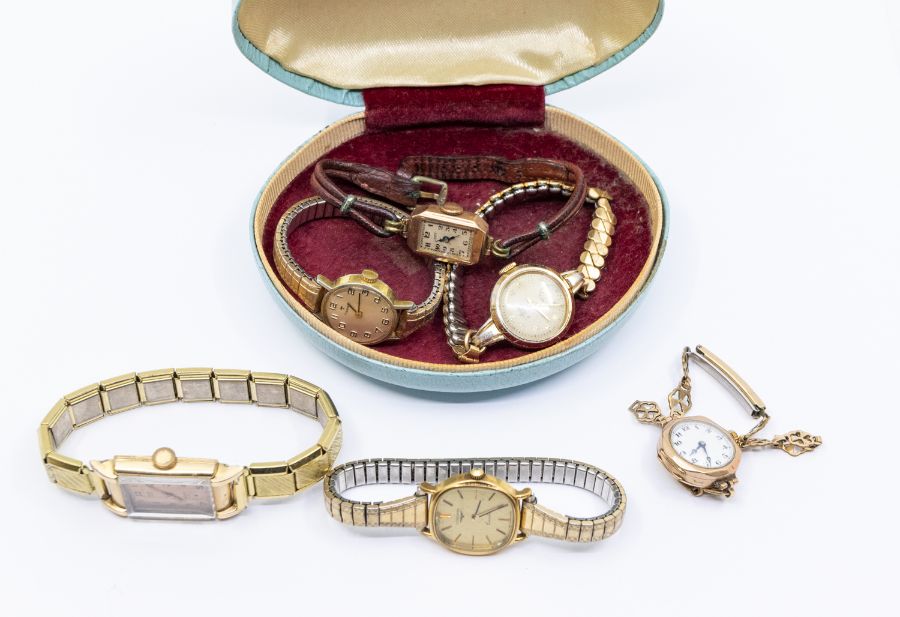 A collection of jewellery and watches to include two vintage ladies 9ct gold dress watches, one with