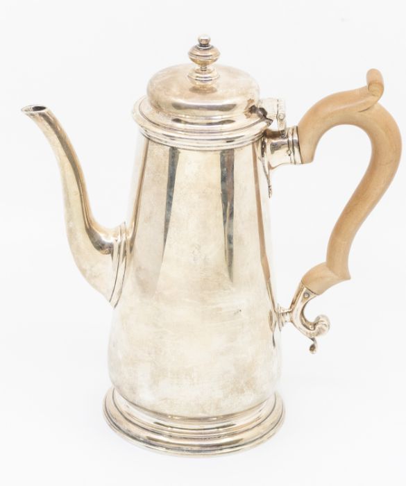 A Georgian style silver plain tapering coffee pot, fruitwood handle, hallmarked by C F Hancock &