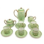A Mikado eggshell coffee set for five, including cups, saucers, milk and sucrier, underglaze green